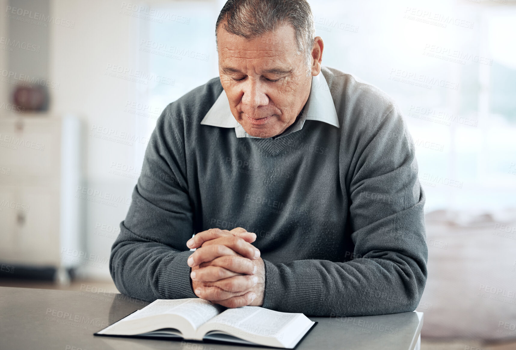 Buy stock photo Bible, reading book or old man praying for hope, help or support in Christianity religion or holy faith. Believe, prayer or senior person studying or worshipping God in spiritual literature at home