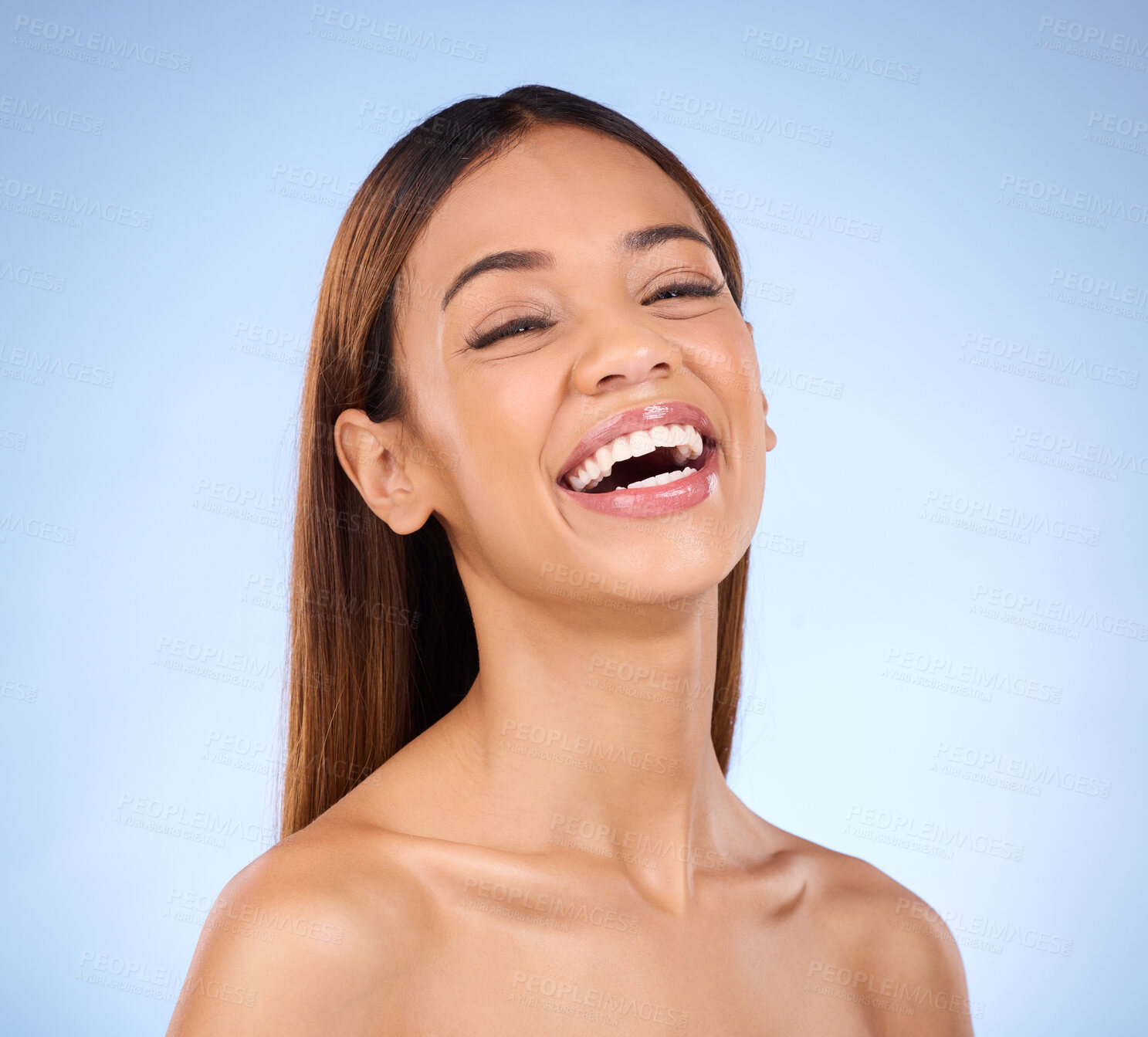 Buy stock photo Skincare, beauty and face of laughing happy woman in studio with smile for skin glow promo on blue background. Makeup, facial and cosmetics, African model for dermatology or spa promotion and mockup.