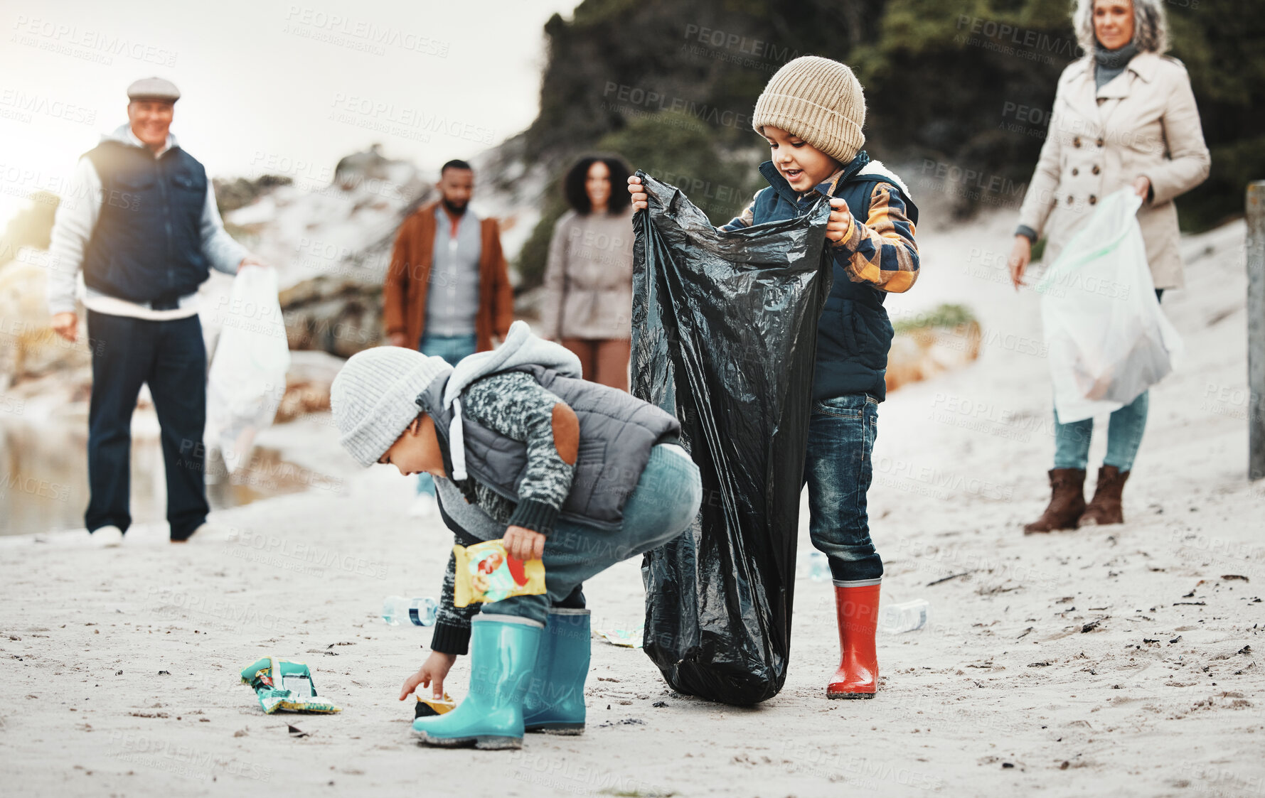 Buy stock photo Beach cleaning, plastic and children, family or volunteer group in education, learning and community service. Happy people and kids help with waste, garbage or trash in climate change or pollution