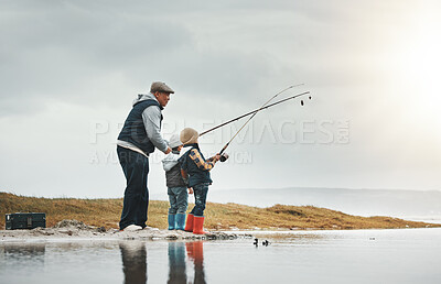 Buy stock photo Lake, outdoor and grandfather fishing with children while on a adventure, holiday or weekend trip. Hobby, travel and elderly man teaching kids to catch fish in nature while on vacation in countryside