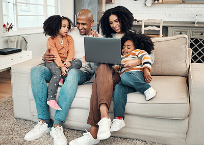 Buy stock photo Happy, relax and family with a laptop for a movie, comedy show or subscription service. Smile, together and parents with children on the sofa for a film, series or entertainment on a computer