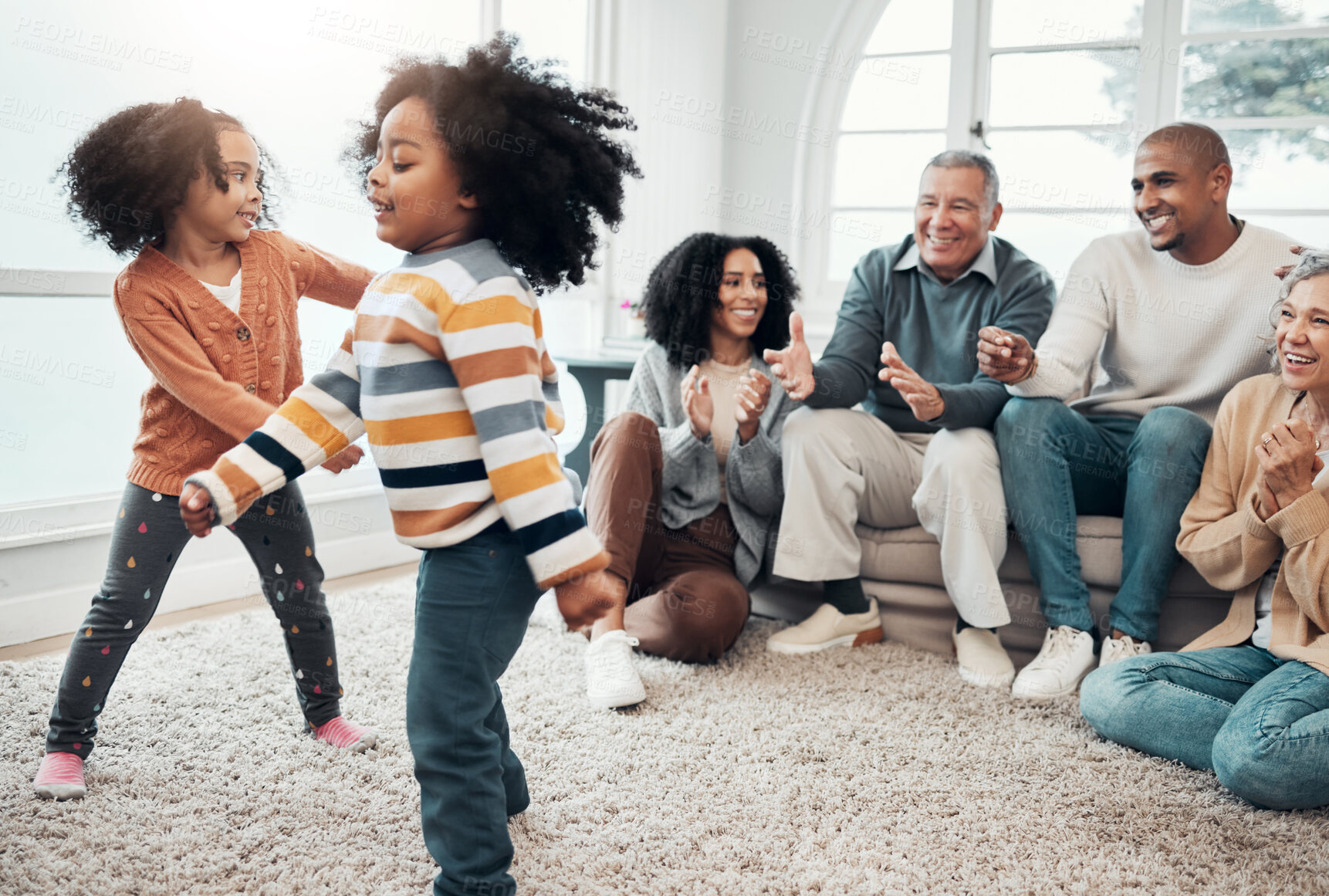 Buy stock photo Happy family, children dancing and living room with parents, grandparents or love with applause in home. Girl kids, mom and dad with dance, smile or happiness for bonding in house together on holiday