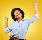 Happy, cheering and excited black woman with freedom isolated on a yellow background in a studio. Smile, success and an African girl in celebration of an achievement, promotion or winning a prize