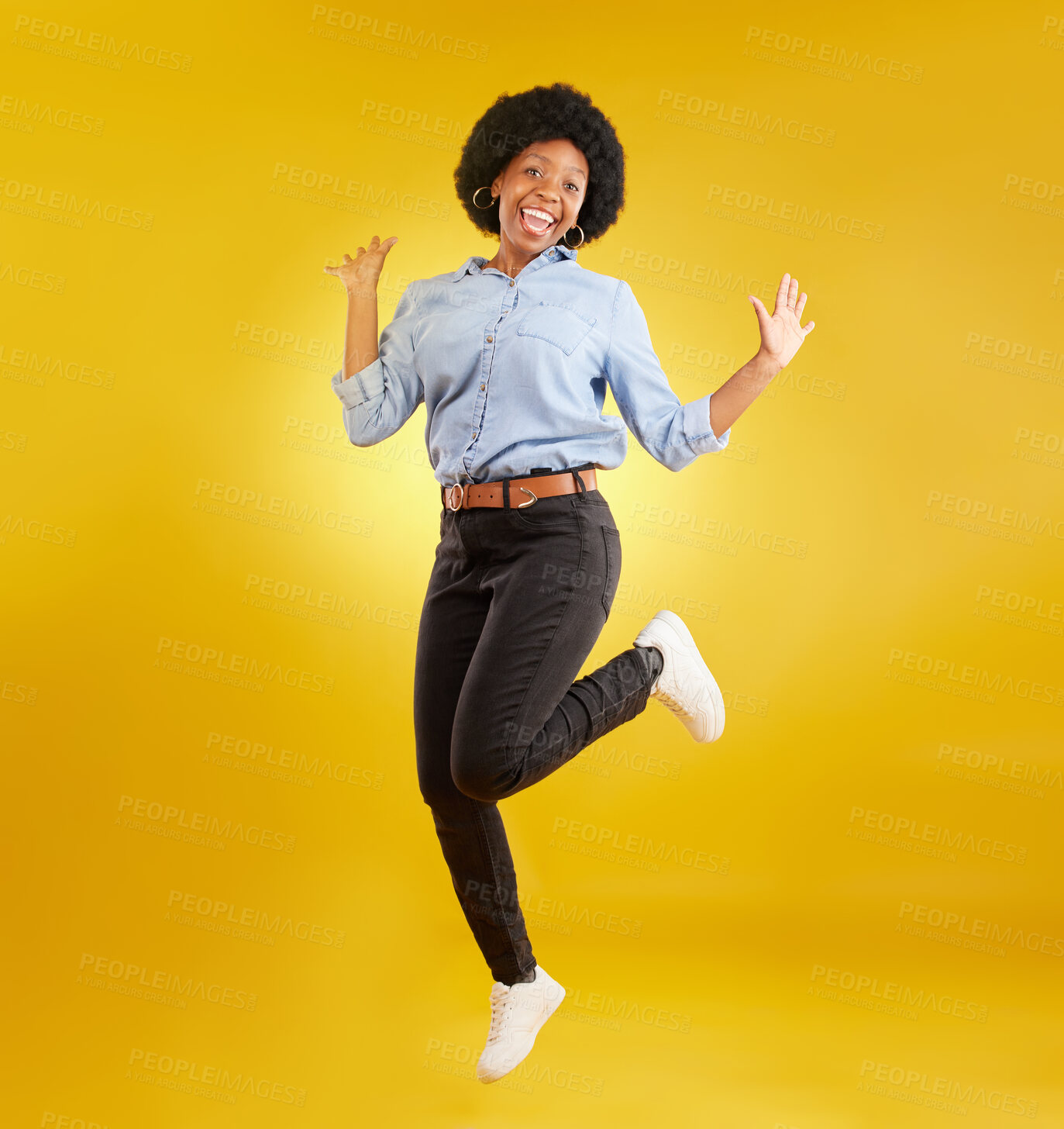 Buy stock photo Jump, excited and portrait of black woman on yellow background with energy, happiness and smile in studio. Winner mockup, celebration and isolated happy girl jumping for freedom, winning and success