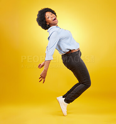 Buy stock photo Wow, excited and happy black woman in dance pose on yellow background with energy, happiness and smile. Winner mockup, celebration and isolated girl dancing for freedom, winning and success in studio