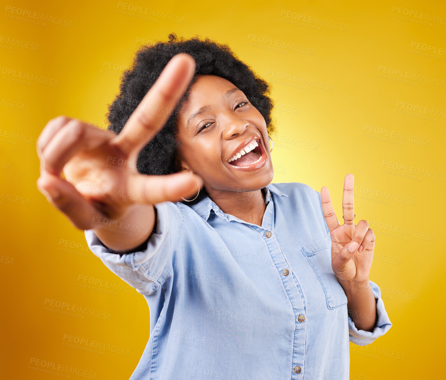 Buy stock photo Black woman, peace sign and happy portrait in studio excited, smile and positive on a yellow background. African female model with hand, icon or happiness emoji for freedom, motivation and self love