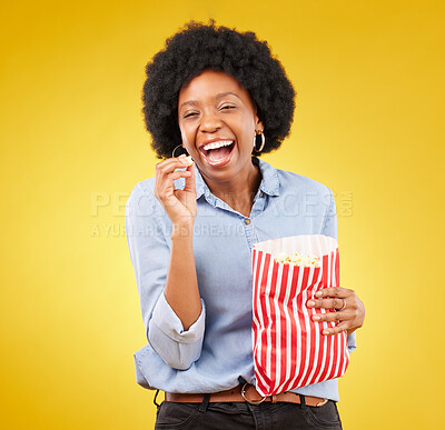 Buy stock photo Happy, smile and popcorn with black woman in studio for movie, streaming service and cinema. Laugh, comedy and theatre with female and snack isolated on yellow background for food, tv and film