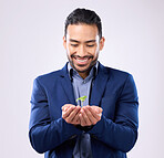 Plant in happy man hands for business growth isolated on a white background in eco friendly investment. Asian person  with sapling soil in palm for sustainable startup and green investing in studio