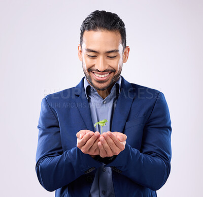 Buy stock photo Plant in happy man hands for business growth isolated on a white background in eco friendly investment. Asian person  with sapling soil in palm for sustainable startup and green investing in studio