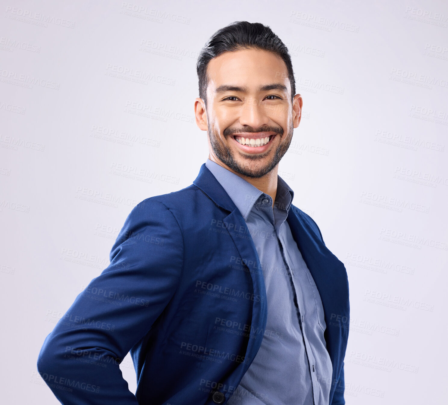 Buy stock photo Happy, smile and portrait of a businessman in studio with a confident, proud and positive mindset. Happiness, excited and professional male employee from India standing with pride by gray background.