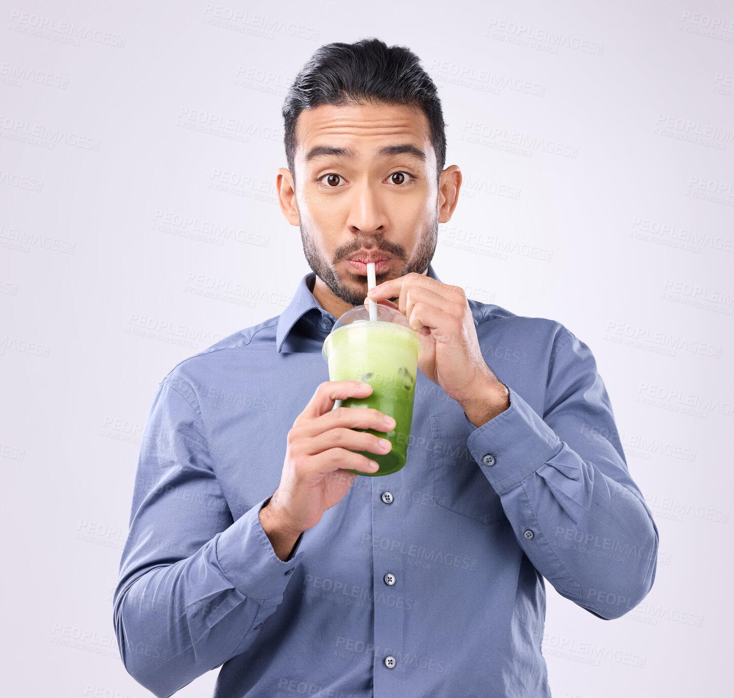 Buy stock photo Portrait of man drinking smoothie isolated on white background diet, detox and healthy breakfast choice. Asian business person with green juice for nutrition, energy protein or vegan drink in studio
