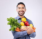 Healthy, groceries and portrait of an Asian man with vegetables isolated on a white background in a studio. Smile, holding and a Japanese male with food for a diet, vegan lifestyle and nutrition