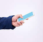 Man, hand and phone with green screen in studio for communication or network connection on website. Hands of male with smartphone for internet search, mobile app or mockup chat on a white background 