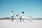 Holding hands, family and children walking on beach to relax on summer holiday, vacation and weekend. Travel, blue sky and grandparents, parents and kids by ocean for fun, bonding and quality time