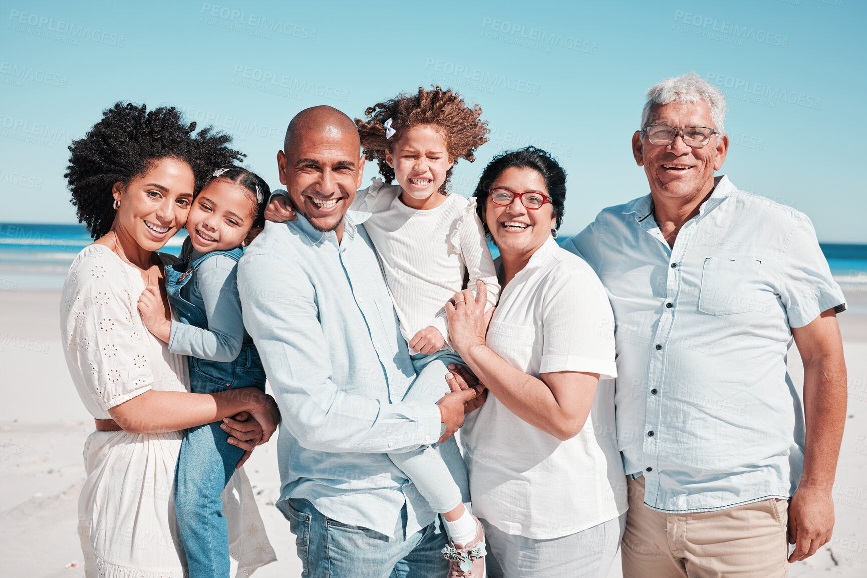 Buy stock photo Parents, kids and grandparents in beach portrait on walk, freedom and vacation together with love. Old man, woman and grandchildren by ocean for happiness, wellness and adventure on holiday in summer