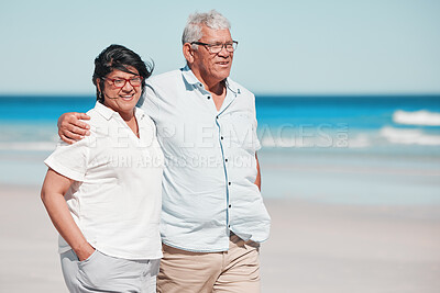 Buy stock photo Senior couple walking on beach for love, care and relax on summer holiday in nature, sunshine or trust. Happy retirement, man and woman walk at sea, happiness and travel with partner, smile and ocean