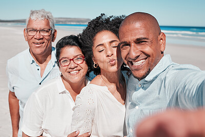 Buy stock photo Family, smile and selfie portrait at beach on vacation, bonding and care at seashore. Holiday kiss, summer ocean and couple relax with grandparents taking pictures for social media and happy memory.