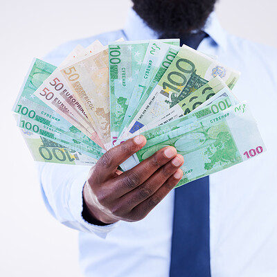Buy stock photo Finance, money and hands of black man in studio for winner, investment and wealthy. Success, payment and profit with male holding cash isolated on white background for cashback, salary and rich