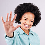 Happy, smile and hand with portrait of black woman in studio for confidence, positive and relax. Happiness, stretching and palm with female on gray background for cheerful, carefree and friendly