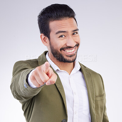 Buy stock photo Portrait, success and Asian man pointing to you, happiness and cheerful against a grey studio background. Face, Japanese male employee and guy with gesture for space or finger show choice or decision