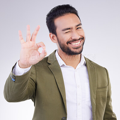 Buy stock photo OK hand, portrait and business man isolated on a white background career, job success and agreement with wink. Like, yes and okay sign or emoji of asian person, entrepreneur or worker face in studio