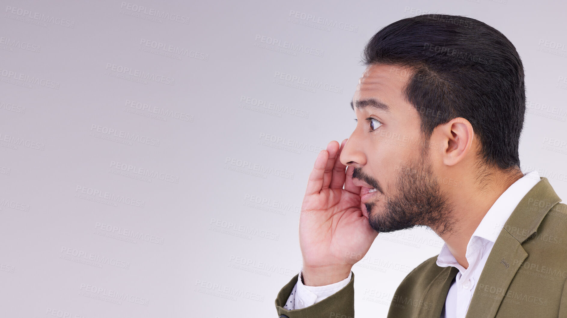 Buy stock photo Mockup, secret and Asian man with gossip, whisper and talking against a grey studio background. Japan, male and guy with privacy, space and announcement with person, sharing opinion and mysterious