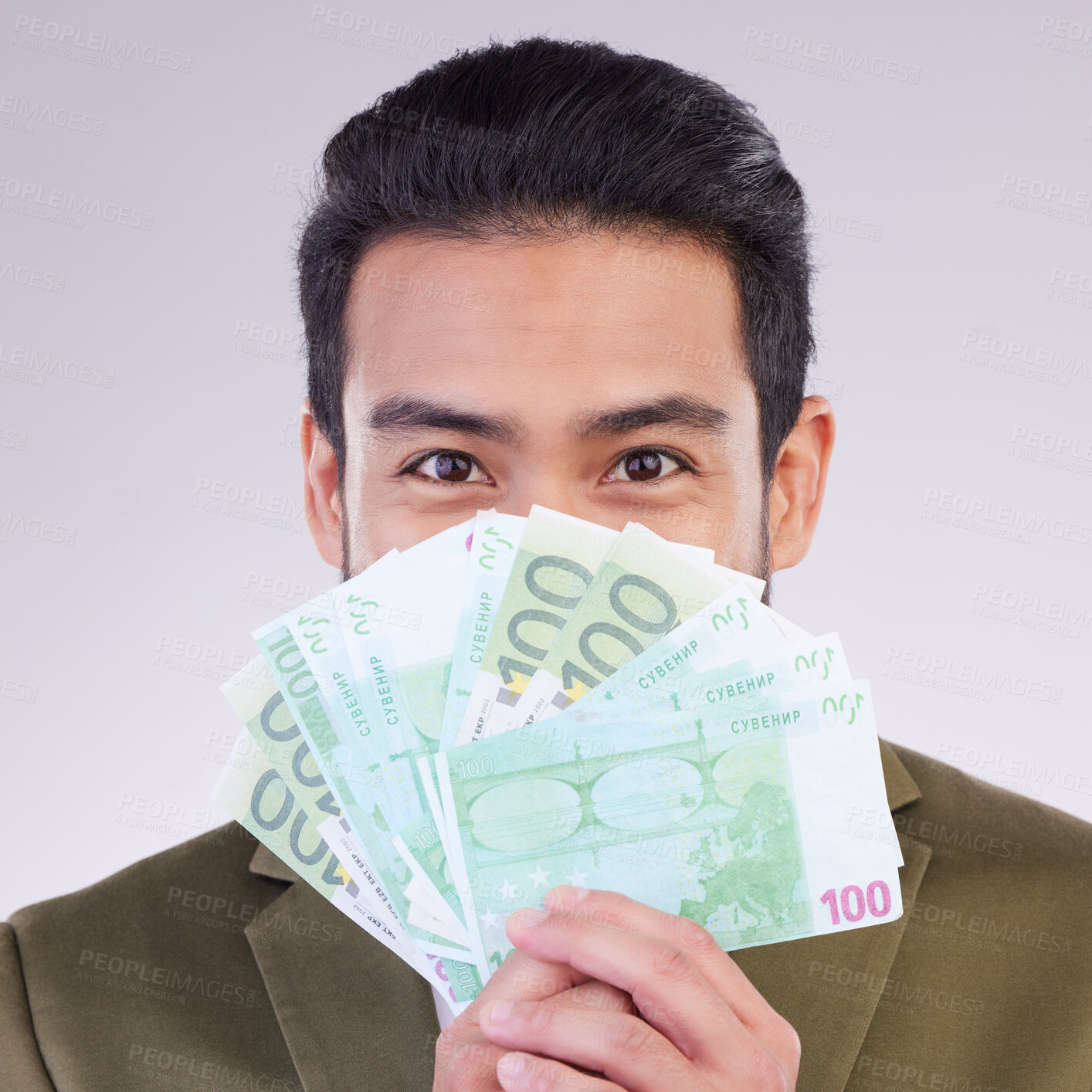 Buy stock photo Portrait, cash and euro with a business man in studio holding money on a gray background for finance. Smile, accounting or investment with a happy male employee proud of his financial trading success