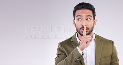 Buy stock photo Business man, mockup and finger on lips in studio, white background and privacy secret. Male employee, silence and shush for quiet sign, gossip and whisper emoji of corporate mystery, news or mock up