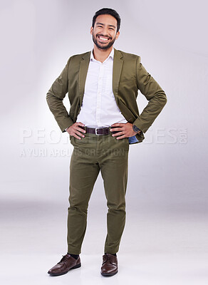 Buy stock photo Portrait, smile and a business man in studio standing hands on hips against a gray background feeling confident. Success, motivation and vision with a happy male employee looking proud or positive