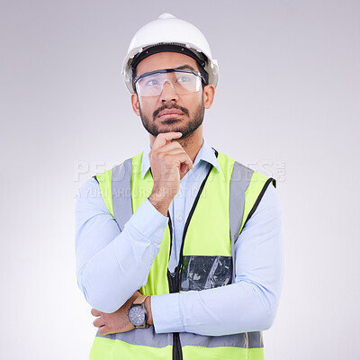 Buy stock photo Construction worker thinking, serious man with ideas and architect or engineer in building industry on studio background. Male contractor, mockup and professional builder with helmet and goggles