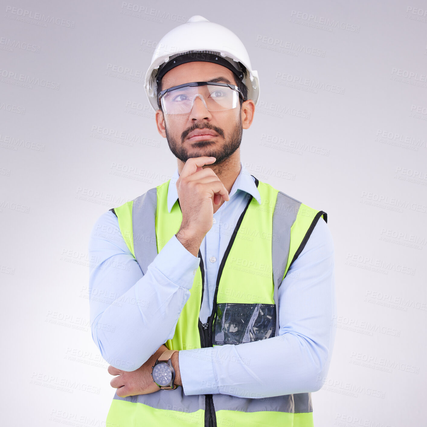 Buy stock photo Construction worker thinking, serious man with ideas and architect or engineer in building industry on studio background. Male contractor, mockup and professional builder with helmet and goggles