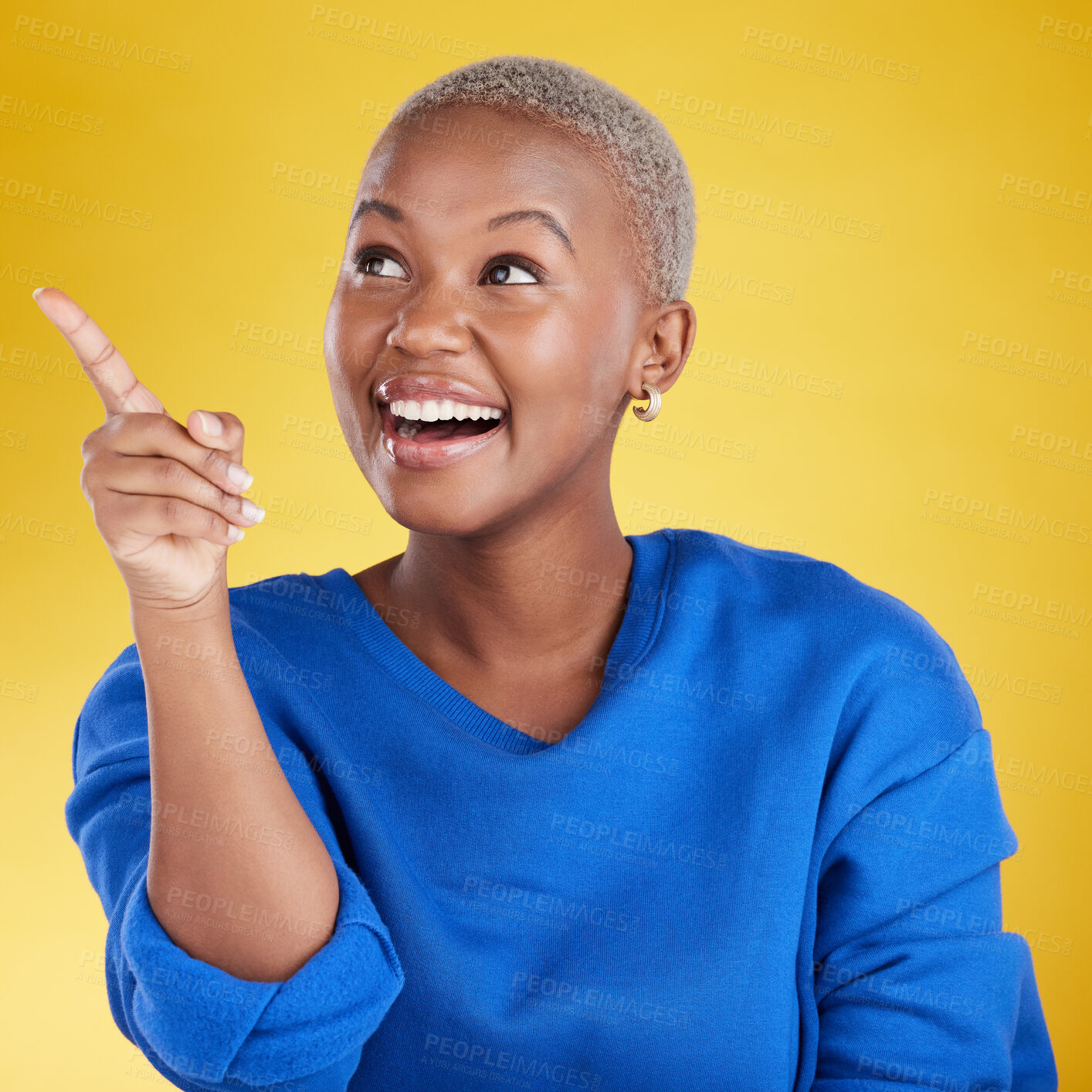 Buy stock photo Smile, pointing to mockup and black woman in studio isolated on a yellow background. Thinking, happy and African female model point to advertising, marketing or product placement for branding space.