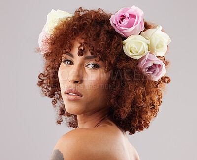 Buy stock photo Portrait, beauty and flowers with a model black woman in studio on a gray background for natural skincare. Wellness, luxury and face with an attractive young female wearing a flower crown or wreath