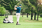 Golf, stroke and focus with a sports man swinging a club on a field or course for recreation and fun. Golfing, grass and training with a male golfer playing a game on a course during summer