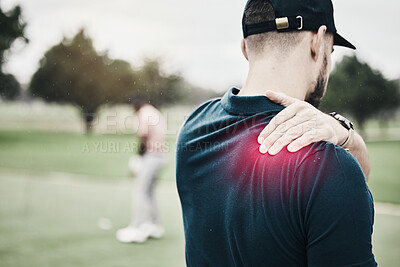 Buy stock photo Sports, injury and golf, man with shoulder pain during game on course, massage and relief in health and wellness. Green, hands on muscle for support and golfer with body ache during golfing workout.