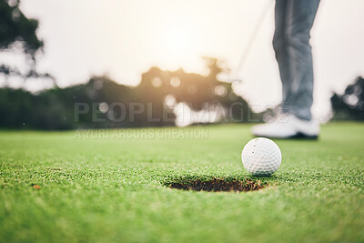Sports, golf ball and hole on course in club for competition match, tournament and training. Target, challenge and games with equipment on grass field for practice, recreation hobby and practice