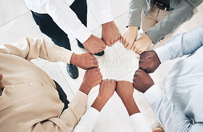 Buy stock photo Mission, circle or business people fist bump for partnership or motivation in office meeting together. Diversity, top view or employees with teamwork, strategy or group support for project goal