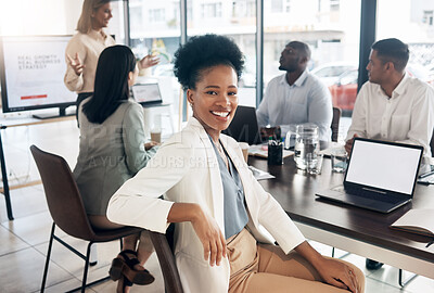 Buy stock photo Portrait, meeting and a business black woman in the boardroom with her team for a strategy presentation on laptop mockup screen. Workshop, training and collaboration with a female sitting at a table