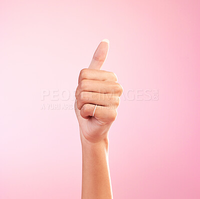 Buy stock photo Thumbs up, yes and hand of woman in studio for success, approval, achievement and support. Like, emoji and thank you with female and gesture isolated on pink background for positive, agreement and ok