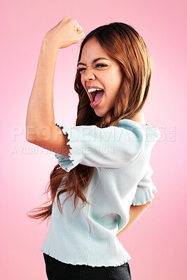 Buy stock photo Strong, happy and woman flexing in a studio for feminism, women empowerment and body positivity. Happiness, excited and portrait of a female model showing her arm strength isolated by pink background