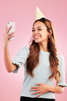 Buy stock photo Selfie, birthday party and smile of woman in studio isolated on a pink background. Photographer, profile picture and happy female taking photo for happy memory, social media or special celebration.