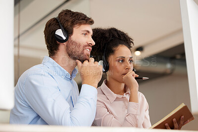 Buy stock photo Man, woman and call center training at computer with notebook, helping hand or thinking together. Crm teamwork, tech support or learning for customer experience with diversity in office with notes