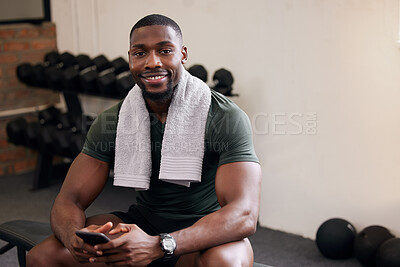 Buy stock photo Gym, phone and portrait of happy man rest to check social media, search internet and workout progress app. Black male, sports break and mobile technology for fitness, smile and bodybuilder training