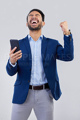 Buy stock photo Winner, excited and phone with man in studio for good news, success and bonus. Pride, yes and celebration with male and cheering isolated on gray background for achievement, pride and job promotion 