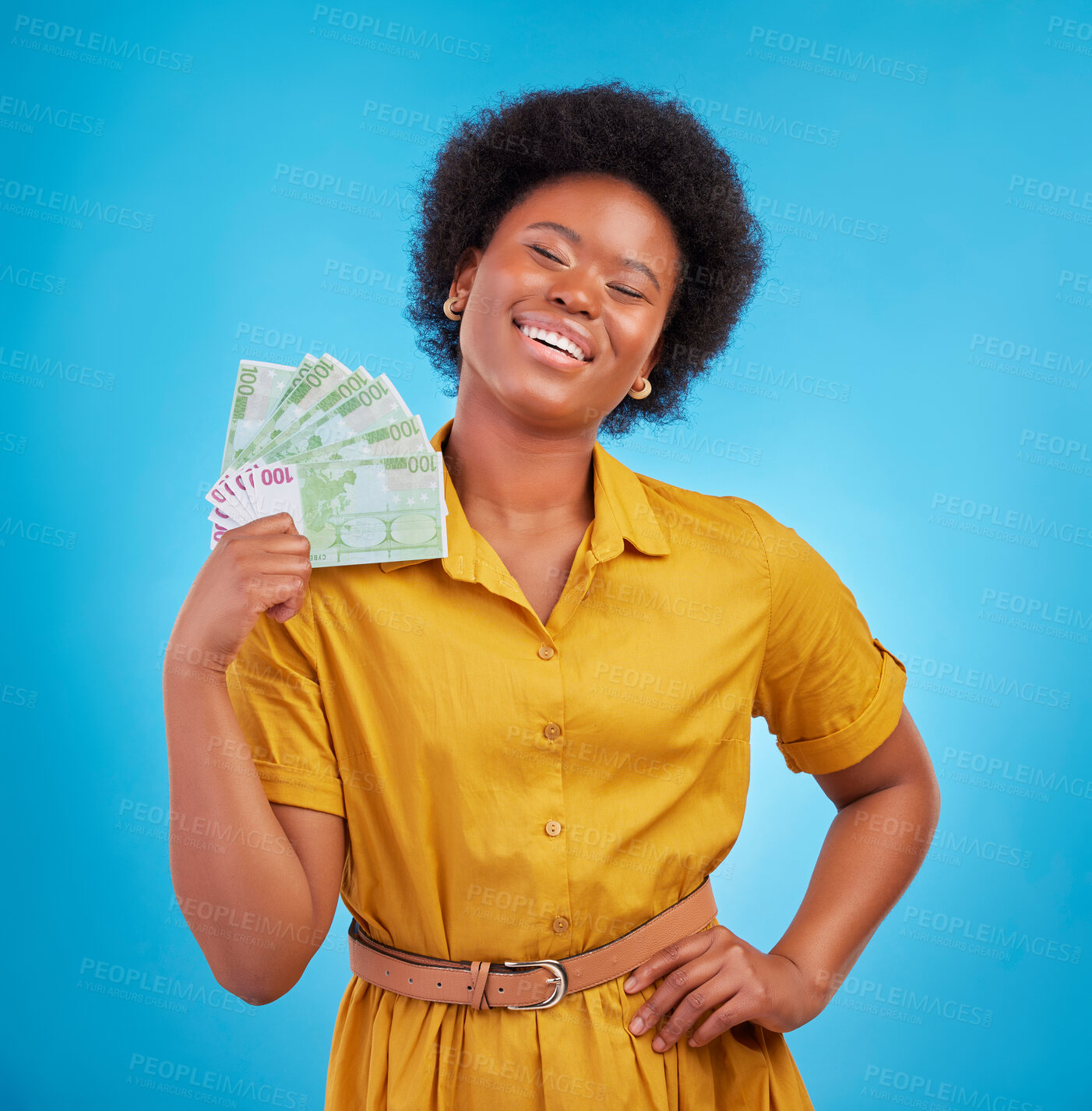 Buy stock photo Black woman, money fan and smile in studio for winning, finance goal and success by blue background. Girl, happiness and cash in hand from casino, gambling and winner with wealth, rich and proud