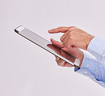 Hands, tablet and business man typing in studio isolated on a white background. Technology, social media and male professional with touch screen for research, web scrolling and internet browsing.