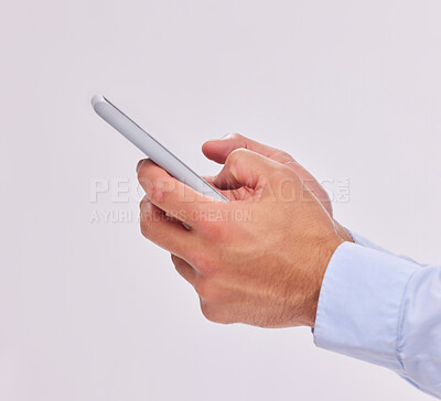 Buy stock photo Hands, technology and typing with phone in studio isolated on a white background. Cellphone, networking and male or man with mobile smartphone for texting, social media or internet browsing online
