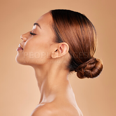Buy stock photo Beauty, face and a woman profile for skin glow and shine in studio on brown background. Aesthetic female model satisfied with spa facial, dermatology cosmetic and wellness with skincare or self care 