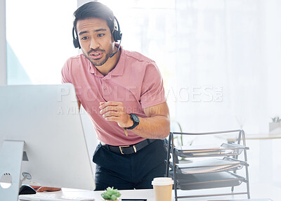 Buy stock photo Asian man, call center and consulting with headphones on computer for customer service or desktop support at office. Male consultant agent talking with headset on PC for online telemarketing advice