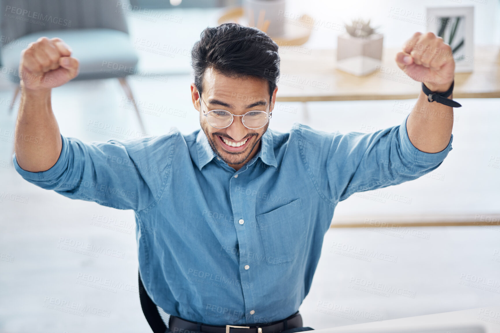 Buy stock photo Winner, success and happy businessman in office, celebrating and excited for email, review or loan approval. Hands, celebration and corporate male online winner with emoji, wow or winning gesture